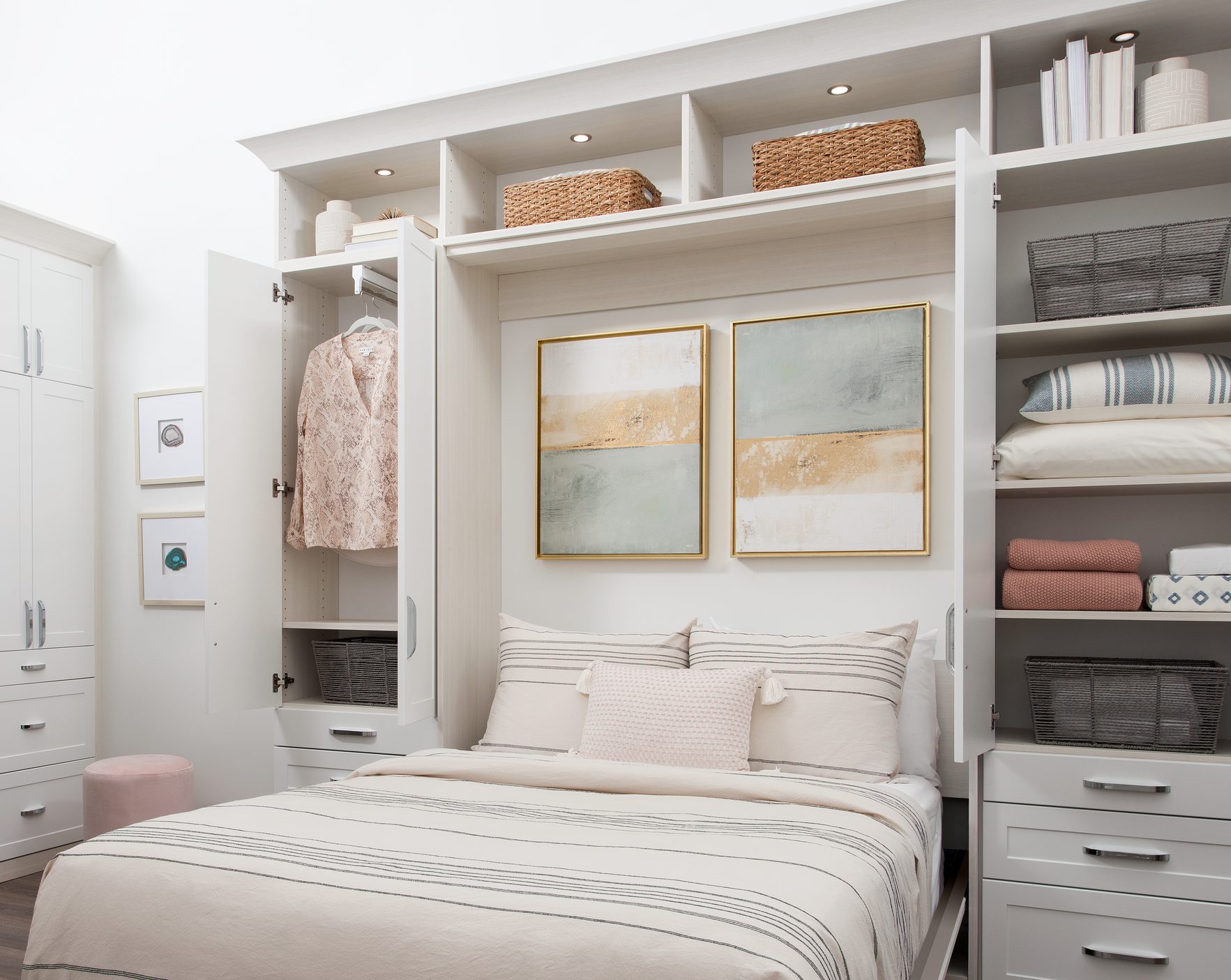 White murphy bed with hidden hanging shelving