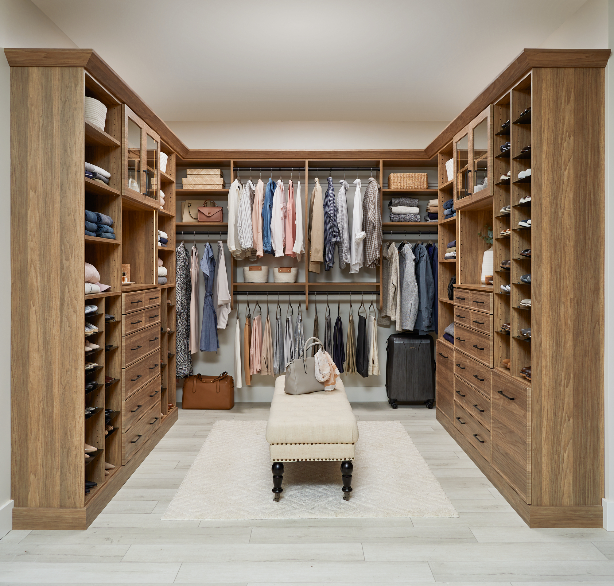 Men and Women's custom walk in closet with armoire from Inspired Closets
