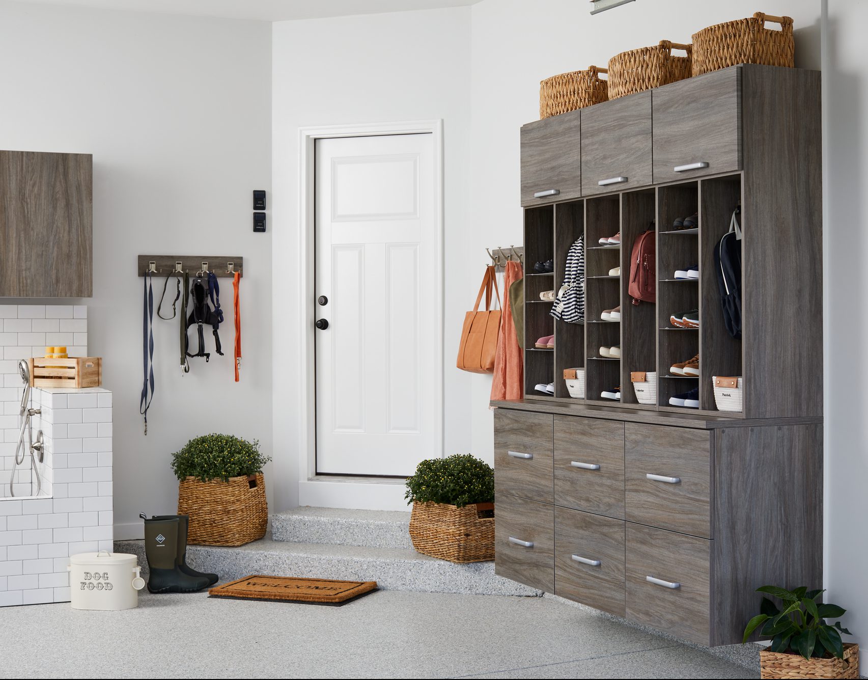 Custom garage entryway storage from Inspired Closets