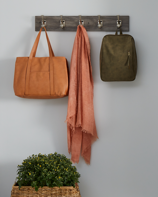 Custom hook storage for garage entryway from Inspired Closets