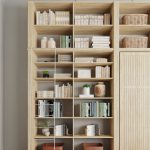 Custom built in library shelves for Inspired Closets Murphy Bed