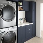 Navy blue laundry room storage system from Inspired Closets