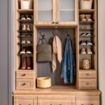 Entryway storage system with lighting, shoe storage and drawers