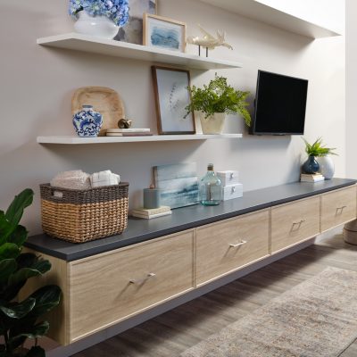 Two tone floating entertainment shelves with drawers from Inspired Closets