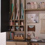 Craft station with hidden wrapping paper storage from Inspired Closets