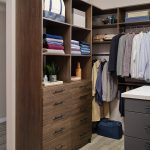Men's walk-in closet with shelves and drawers in Interlochen from Inspired Closets