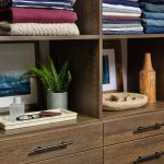 Personal item storage for a men's walk-in from Inspired Closets