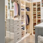 Mirrored closet doors for storage from Inspired Closets