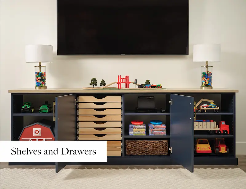 Navy entertainment center with Lego and toy truck storage from Inspired Closets