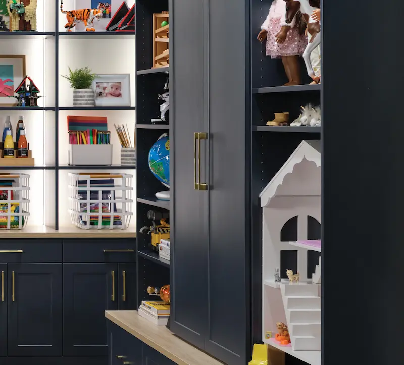 Closed door storage in navy for kids toys from Inspired Closets