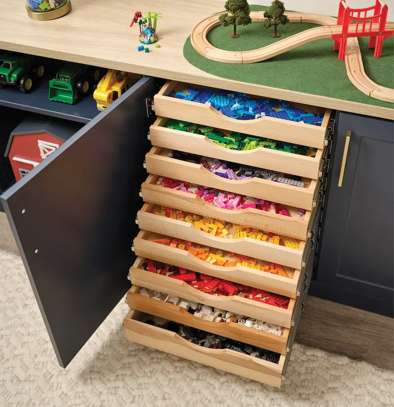 Pull out hidden drawers for Lego storage from Inspired Closets