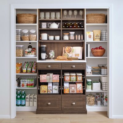 Custom reach-in pantry with pull out basket and drawers from Inspired Closets