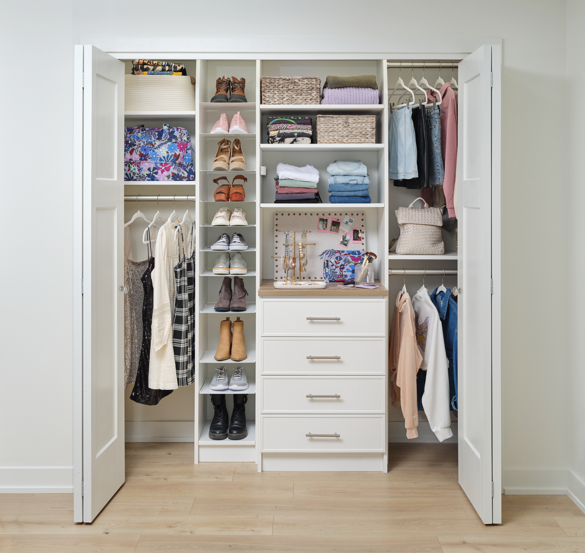 Teen girl's reach-in closet in white from Inspired Closets