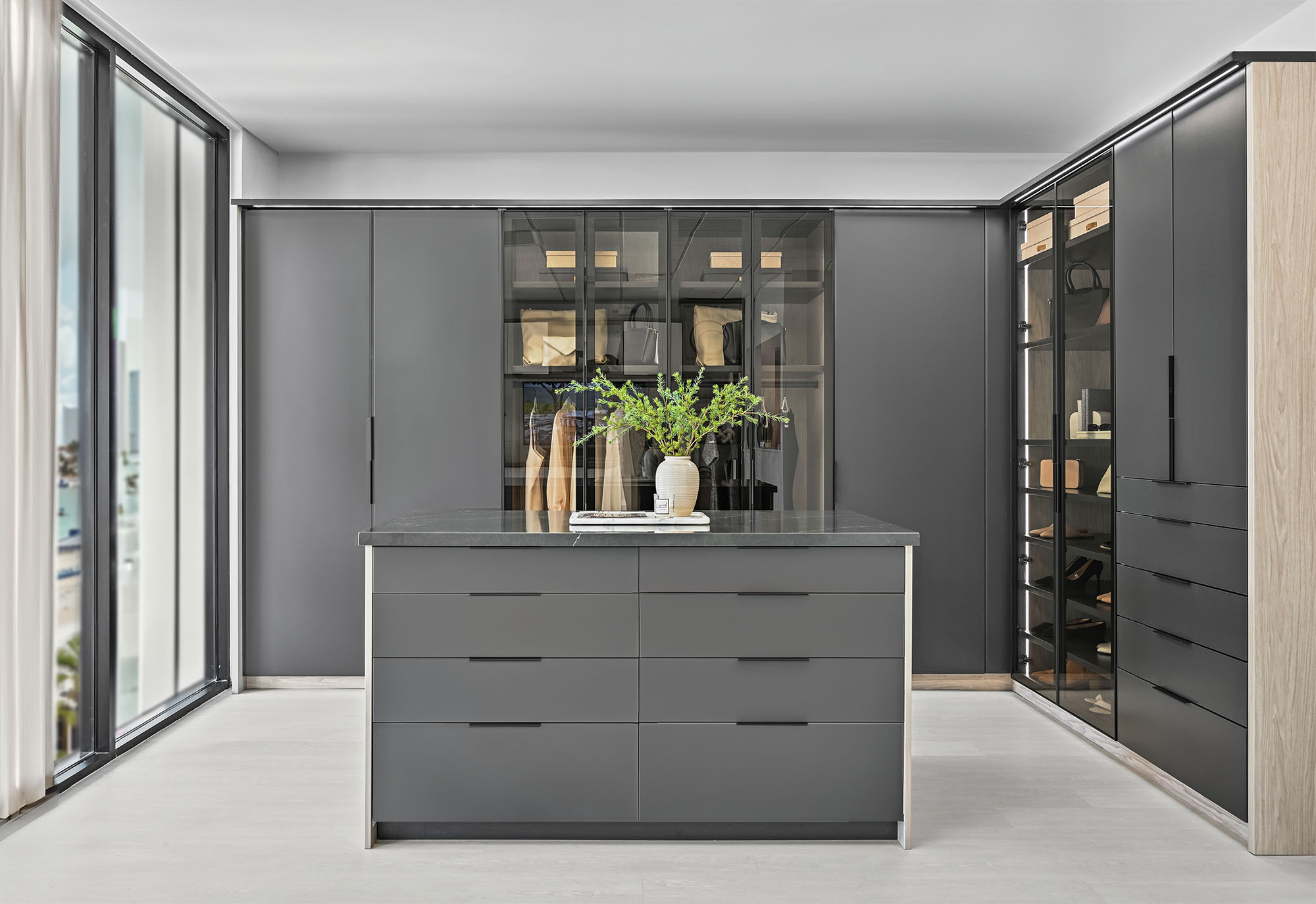 Boutique closet with aluminum glass doors in charcoal