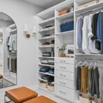 Floor-mounted reach-in closet with hanging and storage