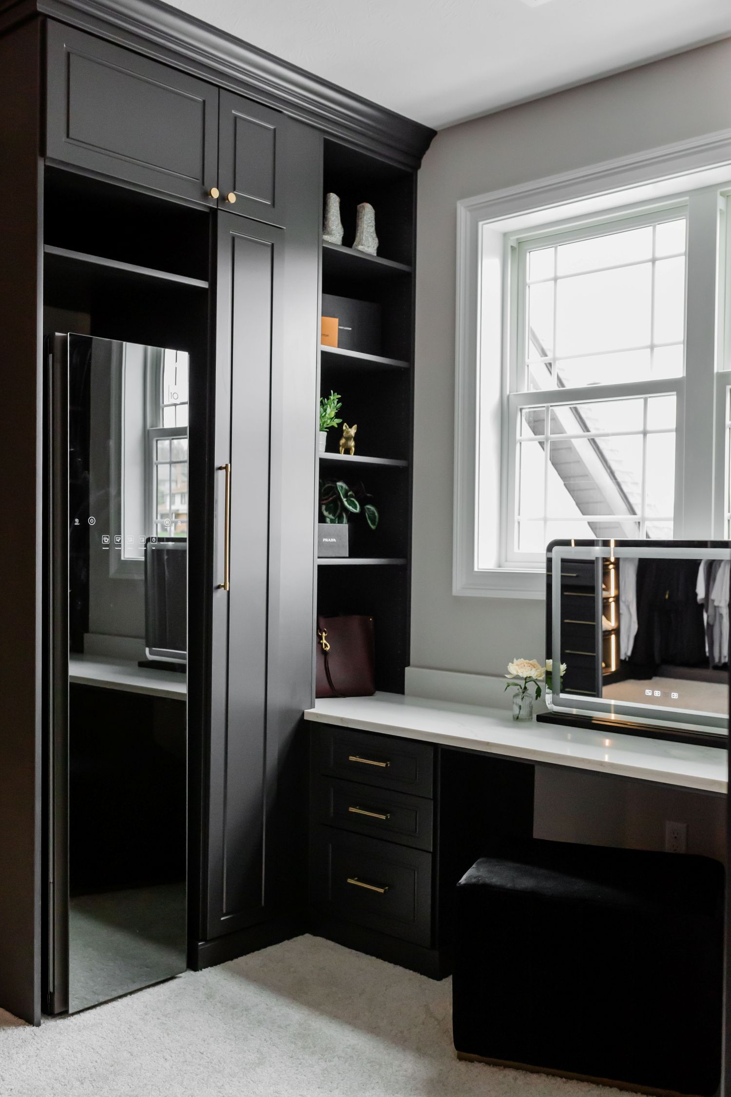 Dedicated vanity space in an Inspired Closets boutique closet.
