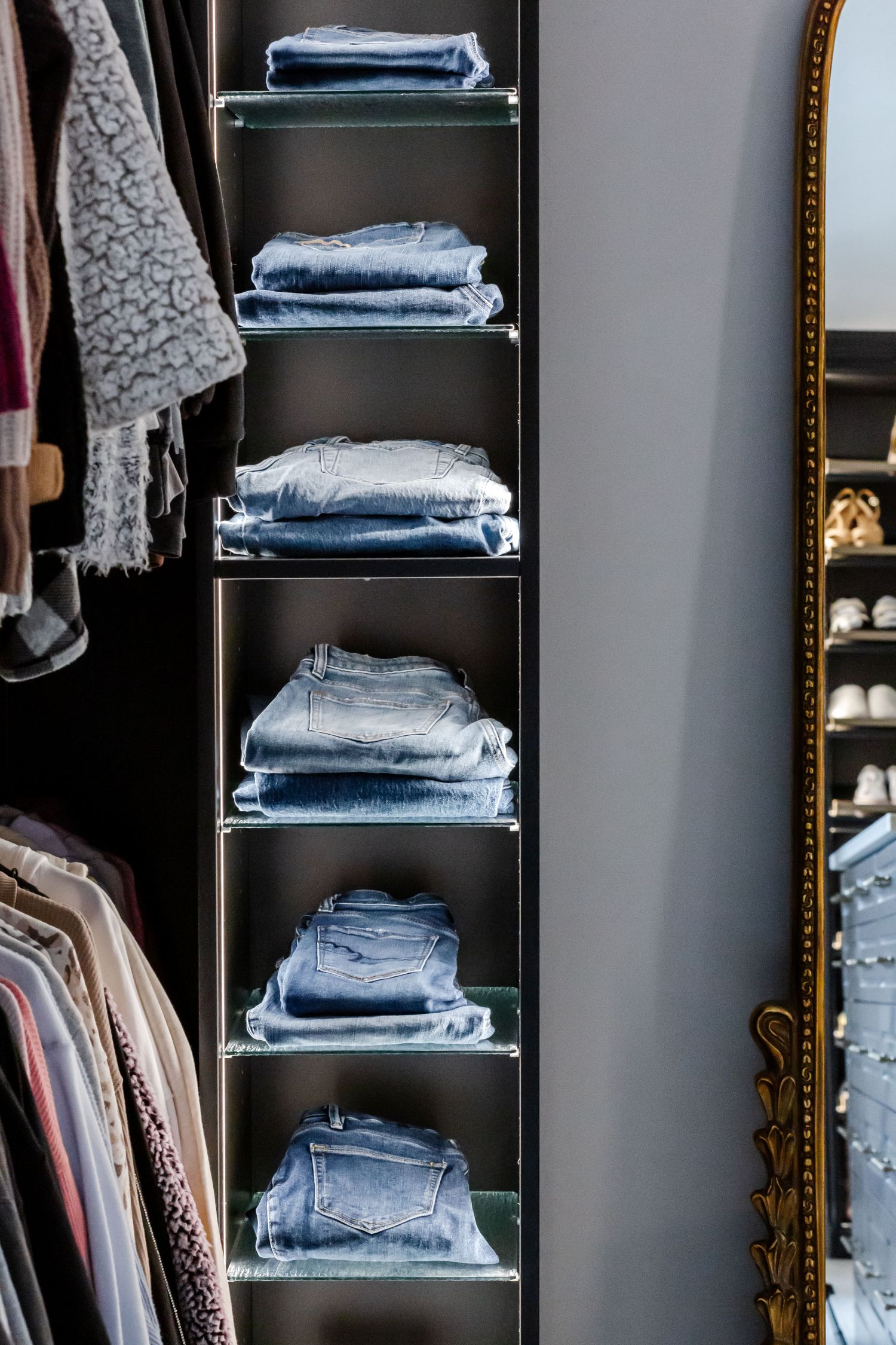 Shoe Shrine used to organize jeans in an Inspired Closets boutique closet.